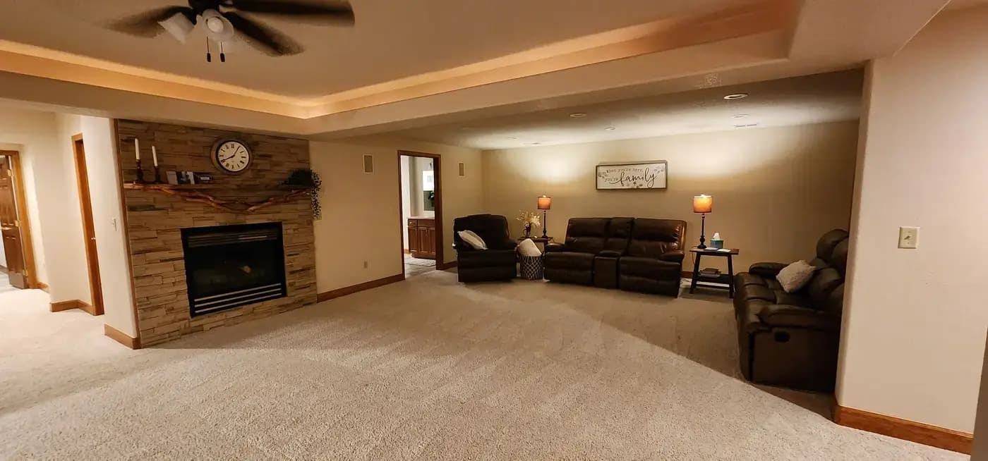 Denver Guest House family room with stone fireplace for hospital family guests